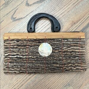 Wood clutch with wooden handle